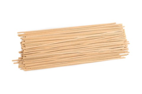 Japanese buckwheat soba noodles isolated on white background. Top view, flat lay, close up
