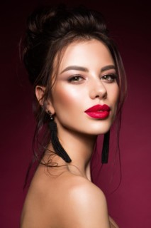 Gorgeous Young Brunette Woman face portrait. Beauty Model Girl with bright eyebrows, perfect