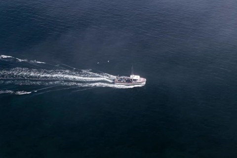 Coastal seascape, fishing boat in fog, Gulf of Saint Lawrence, Province of Quebec, Canada, sea,