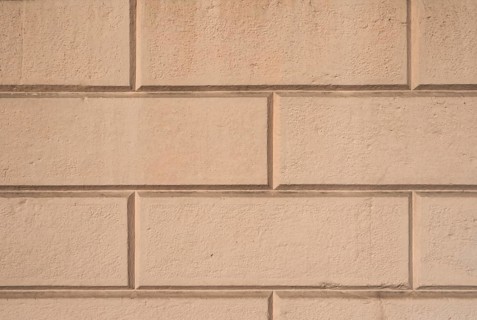 Brown ashlar wall texture background