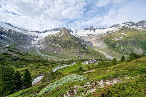 Picturesque mountain landscape, mountain hut Berliner Huette, mountain summit Steinmandl, summit