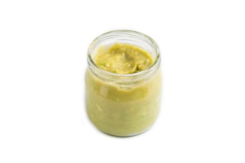 Baby puree with vegetable mix, broccoli, tomatoes, cucumber, avocado infant formula in glass jar