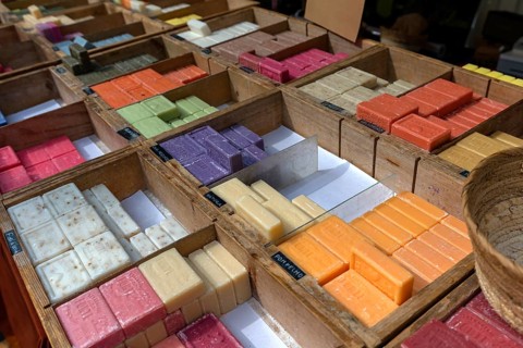 Scented soaps on a market stall in the old town centre, Genoa, Italy, Europe