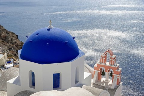 Santorini, Oia, blue domes, churches Agios Spyridon Agios Anastasis from above, Cyclades, Greece,