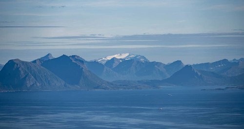 Sea Vestfjorden and mountain peaks on the coast, view from the top of Dronningsvarden or
