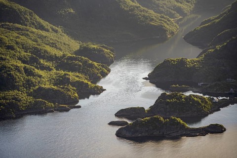 Fjord landscape with atmospheric evening light, Ulvagfjorden fjord and mountains, view from the top