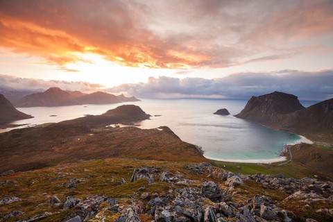 View of Haukland Beach from the summit of Holandsmelen, Lofoten. Dramatic sunset in autumn