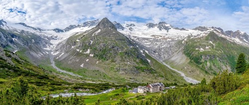 Picturesque mountain landscape, mountain hut Berliner Huette, mountain summit Steinmandl, summit