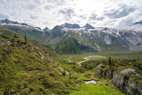 Picturesque mountain landscape, mountain summit with snow and glacier Schwarzensteinkees, summit