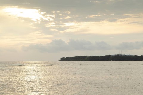 Lombok and Gili Air islands, overcast, cloudy day, sky and sea. Vacation, travel, tropics concept,