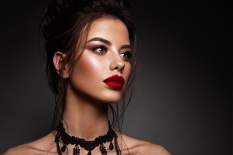 Gorgeous Young Brunette Woman face portrait. Beauty Model Girl with bright eyebrows, perfect