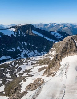 Mountain panorama, glacier remains of Skalabreen, view from the summit of Skala, Loen, Norway,