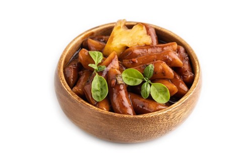 Tteokbokki or Topokki, fried rice cake stick, popular Korean street food with spicy jjajang sauce