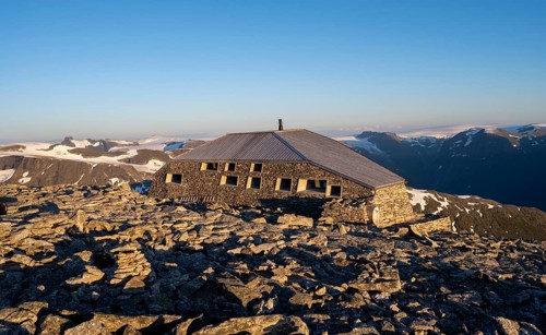 DNT's new mountain hut Skalatarnet, at the summit of Skala, at sunset, Loen, Norway, Europe
