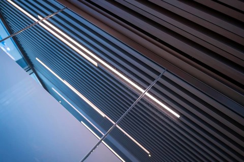 Modern Design of a Glass Wall with Metal Ceiling in Switzerland