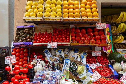 Range of different types of tomatoes and fruit, stand, Limone sul Garda, Lake Garda, Lombardy,