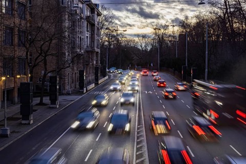 Cars with light trails in the evening, city centre traffic on busy B14 federal road at Neckartor,
