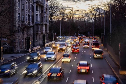 Cars with light trails in the evening, city centre traffic on busy B14 federal road at Neckartor,