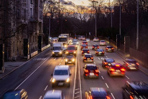 Cars with light trails in the evening, city centre traffic on busy B14 federal road at Neckartor,