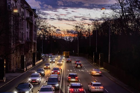 Cars with light trails in the evening, city centre traffic on busy B14 federal road at Neckartor,