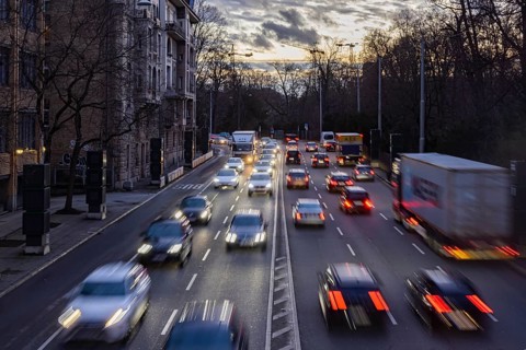Cars with light trails in the evening, city centre traffic on busy B14 federal road at Neckartor,