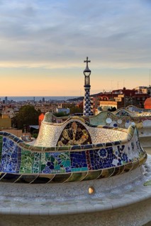 Curved bench, ceramic mosaic, Trencadis, viewing platform at sunrise, Park Güell, Barcelona,