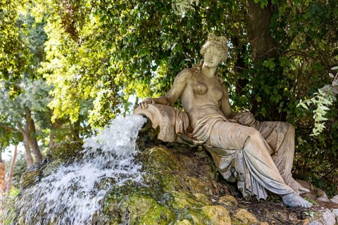 Temple of Aesculapius, Villa Borghese Lake. Water fountain statue detail. Rome, Italy, Europe