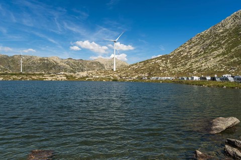 Gotthard Pass, Lago della Piazza at the top of the pass, wind turbines in the background, Canton