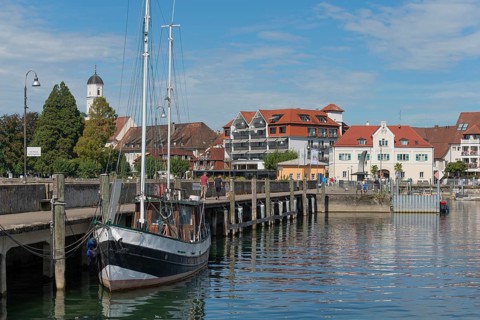 Langenargen on Lake Constance, townscape, harbour, cutter, quay wall, St. Martin's Church,