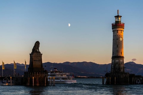 Lindau at Lake Constance, entrance to the harbour, Bavarian lion, new lighthouse, view of the Alps,