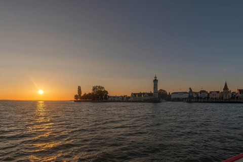 Lindau at Lake Constance, townscape, new lighthouse, entrance to the harbour, evening sun, Bavaria,