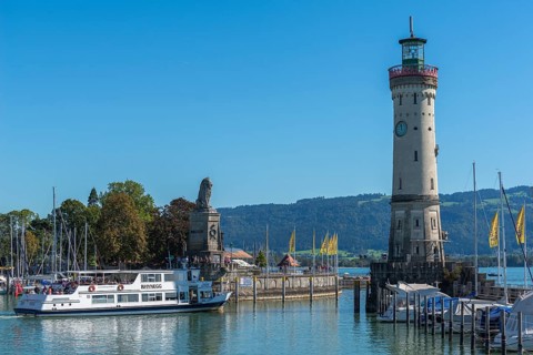Lindau at Lake Constance, entrance to the harbour, new lighthouse, Bavarian lion, passenger ship,