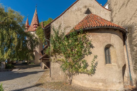 Lindau on Lake Constance, colourful thieves' tower, Romanesque St. Peter's Church, apse, exterior