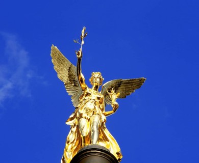 The golden Friedensengel, angel of peace, at Prinzregentenstraße, against a blue sky, Munich,