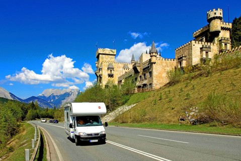 Magic castle with motorhome on the passing road, in the background the Karwendel, Seefeld, Tyrol,