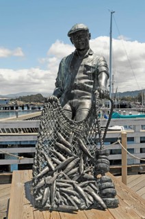 The Fisherman, sculpture, monument in the harbour, Monterey, California, USA, North America