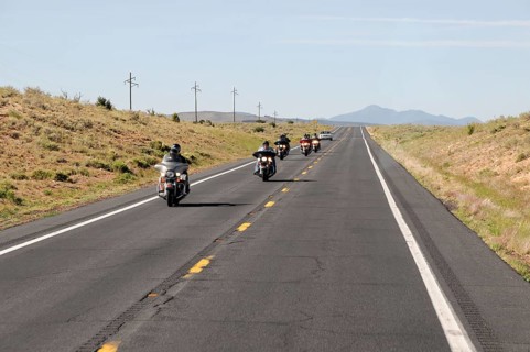 Tourists with motorbike, Route 66, near Seligman, Arizona, USA, North America