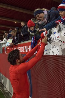 Football match, Marnon BUSCH 1.FC Heidenheim after the match Donation of the jersey to a fan,