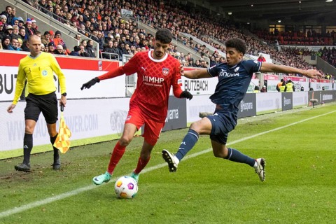 Football match, Eren DINKCI 1.FC Heidenheim left in duel with Fernando DA SILVA Jr. BERNARDO VFL