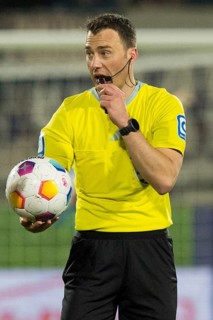 Football match, referee Felix ZWAYER with ball in hand and whistle, Voith-Arena football stadium,