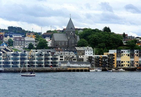 Houses and church in coastal town of Kristiansund, Romsdal county, Norway, Europe