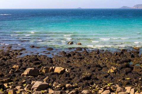 Coastal scenery rocky foreshore, Sennan Cove, Land's End, Cornwall, England, UK