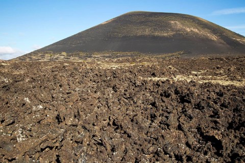 Malpais badlands volcanic landscape Montana Negra volcano cone, Parque Natural Los Volcanes,