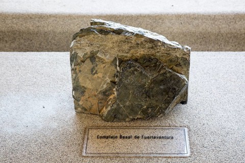 Complex basal rock sample from Fuerteventura, geology display Casa de los Volcanes volcanic study