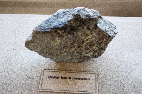 Complex basal rock sample from Fuerteventura, geology display Casa de los Volcanes volcanic study