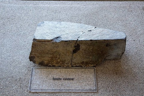 Columnar basalt rock sample geology display, Casa de los Volcanes volcanic study centre, Lanzarote,