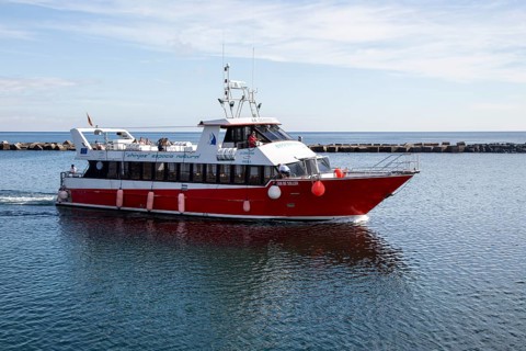 Tourist ferry boat arriving in Orzola harbour from La Graciosa, Lanzarote, Canary Islands, Spain,