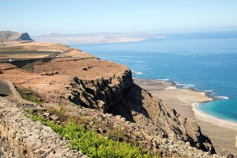 Steep coastal cliffs Risco de Famara looking south from the Mirador el Rio, Lanzarote, Canary