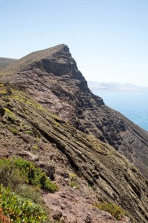 Steep coastal cliffs Risco de Famara looking south from Guinate, Lanzarote, Canary Islands, Spain,