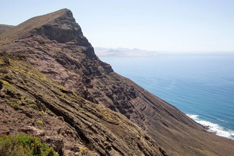 Steep coastal cliffs Risco de Famara looking south from Guinate, Lanzarote, Canary Islands, Spain,